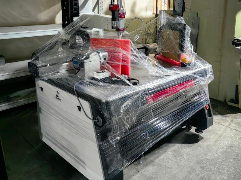 Laser machine packaging and export preparation at Daqing factory