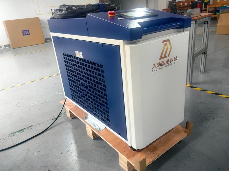 Industrial laser welding machine producing clean weld beads on stainless steel